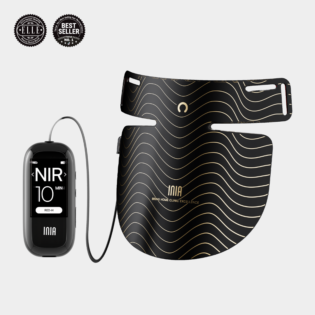 INIA GLOW neck and chest red light therapy device, black mask, gold design, best seller award.