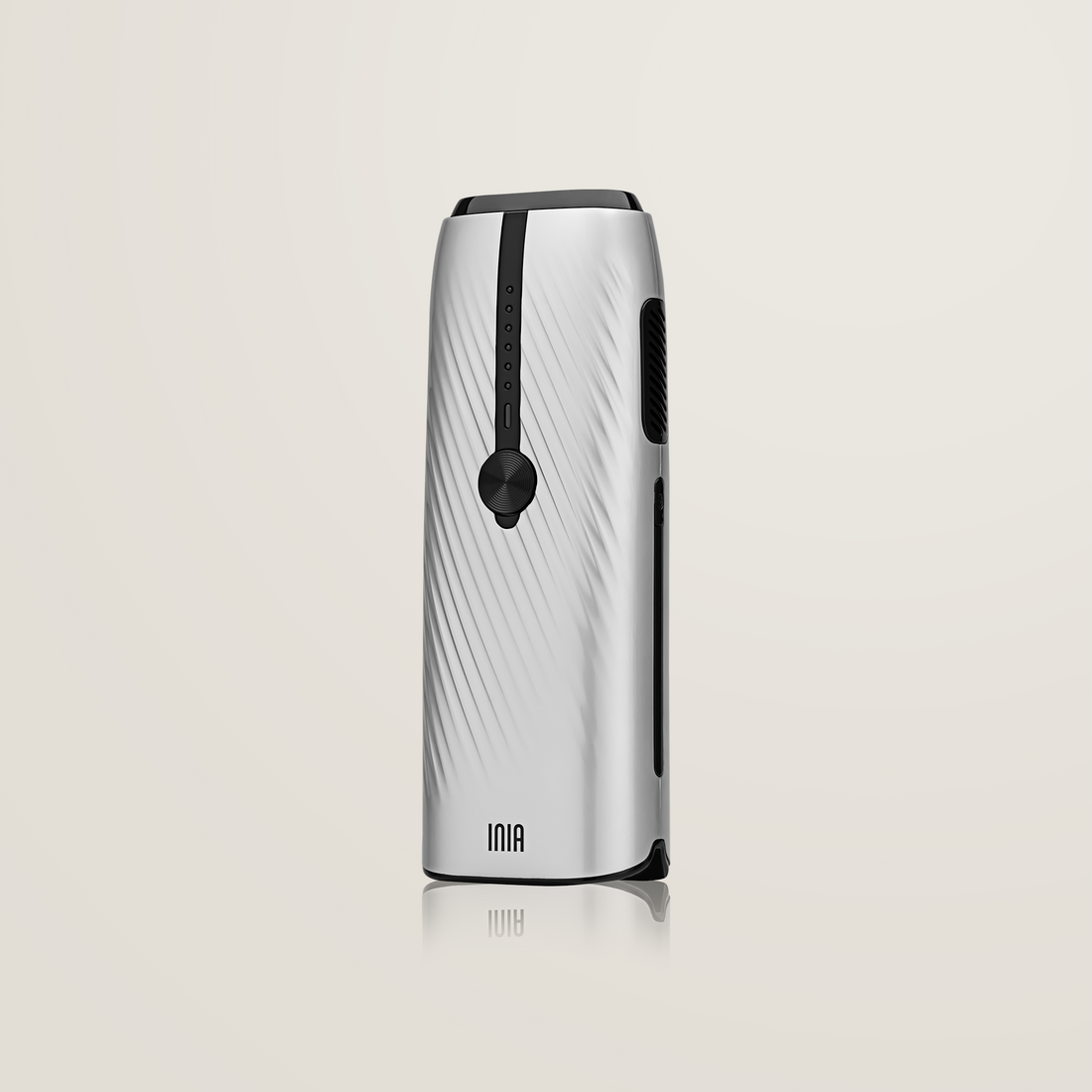 INIA Laser Hair Removal device in silver with black accents, designed for at-home hair removal